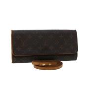 Pre-owned Brunt lerret Louis Vuitton florentinsk clutch