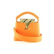 Pre-owned Oransje stoff Louis Vuitton Capucines