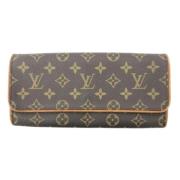 Pre-owned Brunt lerret Louis Vuitton Twin Clutch