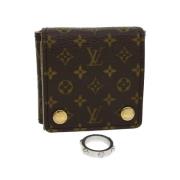 Pre-owned Louis Vuitton-saken i brunt metall