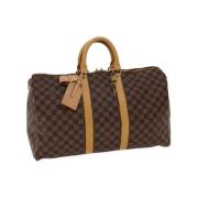 Pre-owned Brunt skinn Louis Vuitton Keepall