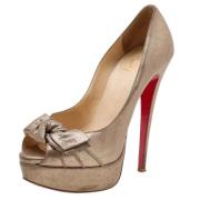 Pre-owned Gull skinn Christian Louboutin haeler