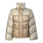 Down jacket with wide sleeve detail by Sacai. The brand has been descr...
