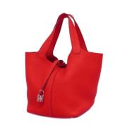 Pre-owned Fabric handbags