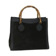 Pre-owned Suede handbags