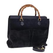 Pre-owned Suede handbags