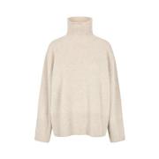 Kosete strikket turtleneck-genser