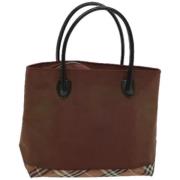 Pre-owned Fabric handbags