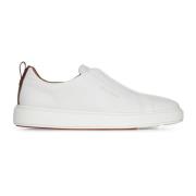 Hvite slip-on sneakers i skinn