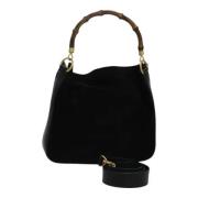 Pre-owned Suede handbags