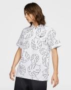 Nike SB leaf print polo shirt in white